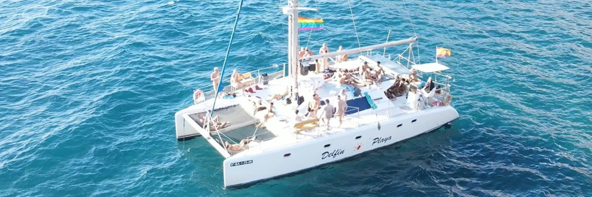 Gay men enjoying a catamaran party in Maspalomas